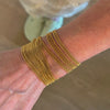 brede armband met fijne strengen